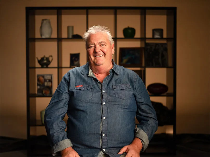 Portrait of Barrie smiling.
