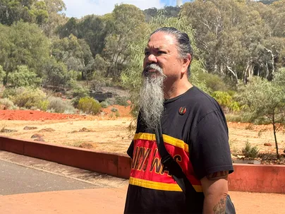 Chris Lee in Botanical gardens in Canberra.