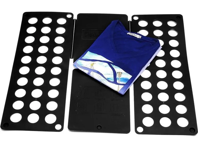 A clothes-folding device from Big W with a folded T-shirt on it.