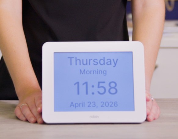 A large display digital calendar clock.