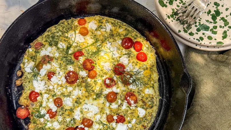 Goat’s cheese and tomato herby omelette pizza.