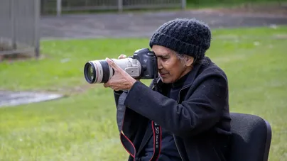 Aunty Barabara McGrady taking photographs 