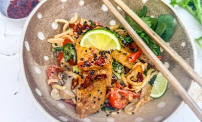 A bowl of delicious peanut tofu dish.