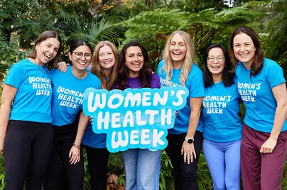 A group of women in blue shirts for Women's Health Week.