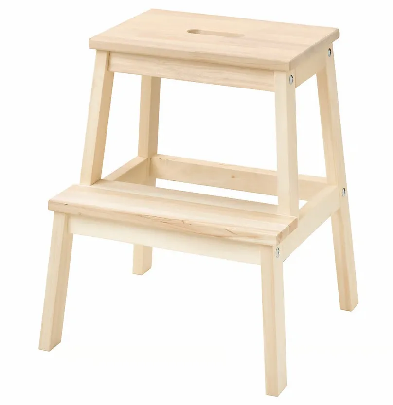 A two-step wooden step stool.