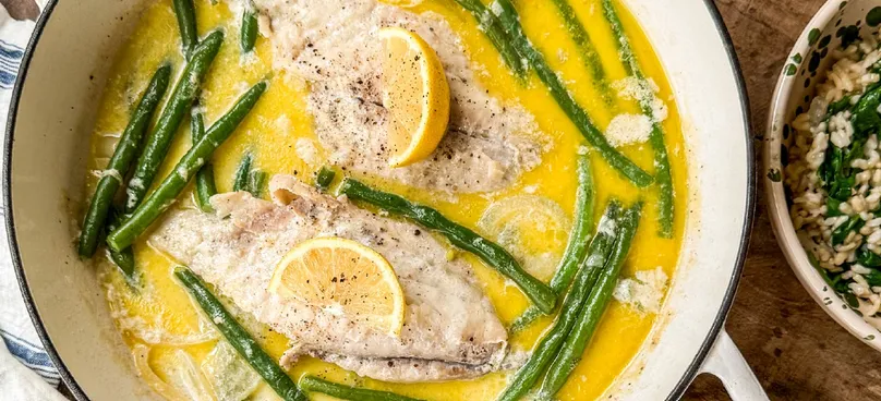 A bowl of butter poached snapper.