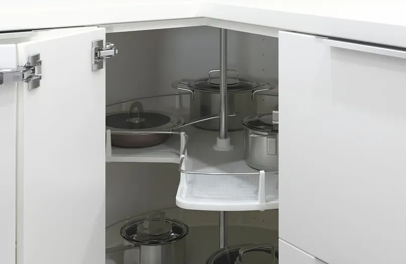 Pots inside a cabinet carousel.