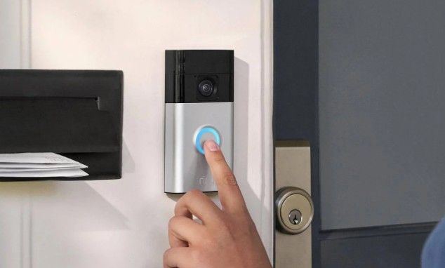 Someone ringing a visual doorbell.